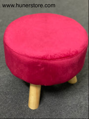 Red velvet foot stool with wooden legs