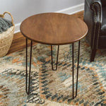 Decent round coffee table with iron stands