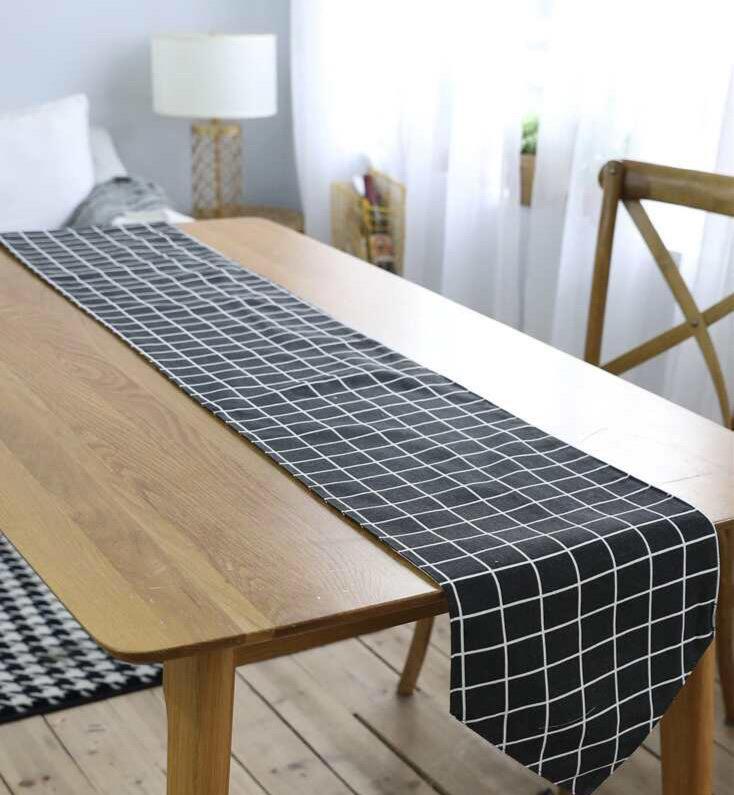 Black & white checker table runner with tussle