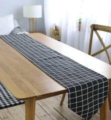 Black & white checker table runner with tussle